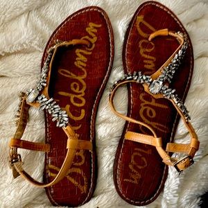 Sandals previously loved.None of the stones have fallen out. Still very wearable